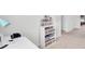 Bright bedroom featuring modern white desk, sleek shelving, and stylish decor at 202 N Light Way, Summerville, SC 29486