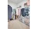 Walk-in closet featuring extensive shelving and hanging space for organized storage at 202 N Light Way, Summerville, SC 29486
