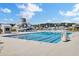 A beautiful community pool features a waterslide and marked lanes for swimming laps on sunny days at 202 N Light Way, Summerville, SC 29486