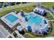 Aerial view of community pool and amenities including lounge seating, pools and covered pavilion at 202 N Light Way, Summerville, SC 29486