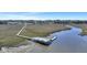 Aerial view of a wooden pier extending into the bay at 2028 Ironstone Aly, Charleston, SC 29407