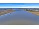 Wide aerial view of a vast river landscape showing a bridge in the distance at 2028 Ironstone Aly, Charleston, SC 29407