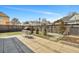 A backyard with a patio, outdoor furniture and dark wooden fence at 2028 Ironstone Aly, Charleston, SC 29407
