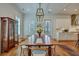 Dining room area featuring a dining table and cabinet at 2028 Ironstone Aly, Charleston, SC 29407