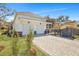 Charming home featuring a three car garage and paved driveway at 2028 Ironstone Aly, Charleston, SC 29407