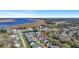 An aerial view displaying a beautiful home in a neighborhood near a pond and scenic river landscape at 2028 Ironstone Aly, Charleston, SC 29407