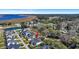An elevated view shows a well-maintained home in a lush neighborhood with mature trees at 2028 Ironstone Aly, Charleston, SC 29407
