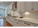 Modern kitchen featuring sleek countertops, updated stainless appliances, and subway tile backsplash at 2028 Ironstone Aly, Charleston, SC 29407