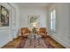Cozy sitting area featuring stylish furniture, a decorative rug, and natural light at 2028 Ironstone Aly, Charleston, SC 29407