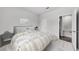 Cozy bedroom featuring a comfortable bed, bedside table, and natural lighting at 215 W Bradford Pointe Drive Dr, Summerville, SC 29483
