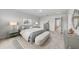 Serene main bedroom with soft colors, comfortable furnishings, and ample natural light at 215 W Bradford Pointe Drive Dr, Summerville, SC 29483