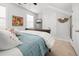 Bedroom featuring plush bedding, a window view, and a cozy interior design aesthetic at 221 Waning Way, Charleston, SC 29492