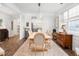 Elegant dining room with hardwood floors, a decorative chandelier, and seating for six at 221 Waning Way, Charleston, SC 29492