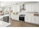 Modern kitchen featuring stainless steel appliances, white subway tile backsplash, and bright lighting at 221 Waning Way, Charleston, SC 29492