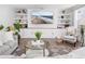 Bright living room with a large sectional sofa, decorative shelving, and plenty of natural light at 221 Waning Way, Charleston, SC 29492