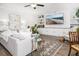 Bright open living room featuring stylish decor, including large sectional and built-in shelving at 221 Waning Way, Charleston, SC 29492