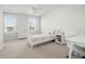 Bright bedroom with a vaulted ceiling, multiple windows, a white bed frame, and a cute desk area at 2305 Sturgeon, Johns Island, SC 29455