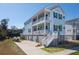 Charming coastal home with multiple decks and convenient garage parking at 2305 Sturgeon, Johns Island, SC 29455