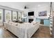 Spacious living room with a cozy fireplace, large sectional sofa, and bright windows at 2305 Sturgeon, Johns Island, SC 29455