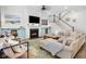 Cozy living room with a fireplace, comfortable seating, and stylish decor at 2305 Sturgeon, Johns Island, SC 29455