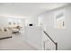 Bright living room featuring a comfortable sofa, contemporary decor, and plenty of natural light from large windows at 2305 Sturgeon, Johns Island, SC 29455