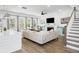 Bright living room with a fireplace, large windows, and open layout at 2305 Sturgeon, Johns Island, SC 29455