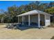 View of an outdoor pavilion with a fire pit and chairs at 2305 Sturgeon, Johns Island, SC 29455