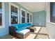 Comfortable outdoor seating area on the porch with views of the surrounding neighborhood, great for relaxing outdoors at 2305 Sturgeon, Johns Island, SC 29455