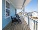 Inviting porch with comfortable wicker furniture and views of the neighborhood, perfect for relaxing outdoors at 2305 Sturgeon, Johns Island, SC 29455