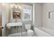 Bathroom featuring a modern vanity, fixtures, subway tile and combo tub and shower at 2416 Pleasant Garden Dr, Charleston, SC 29414