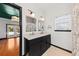 Bathroom includes double vanity with marble countertop, modern fixtures, and shower/tub combo at 2461 Fulford Ct, Mount Pleasant, SC 29466