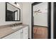 Bathroom featuring a white vanity with granite counters and view to the bedroom at 2461 Fulford Ct, Mount Pleasant, SC 29466