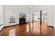 Spacious living room with hardwood floors, fireplace, and modern accents and trim at 2461 Fulford Ct, Mount Pleasant, SC 29466
