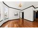 Bright living room with hardwood floors, stylish light fixture and doorways to other rooms at 2461 Fulford Ct, Mount Pleasant, SC 29466