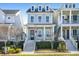 Charming two-story home with a quaint front porch and beautiful blue siding, perfect for suburban living at 2552 Josiah St, Daniel Island, SC 29492