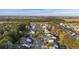 Aerial view of a residential neighborhood featuring single Gathering homes with manicured lawns at 3025 Penny Ln, Johns Island, SC 29455