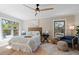 Serene bedroom with natural light, ceiling fan and tranquil decor at 316 Anadale Ct, North Charleston, SC 29418