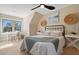 Bright bedroom featuring a comfortable bed, a desk, tasteful decor, and ample natural light at 316 Anadale Ct, North Charleston, SC 29418
