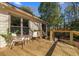Charming wooden deck featuring cozy chairs and a side table, perfect for relaxing outdoors at 316 Anadale Ct, North Charleston, SC 29418