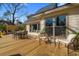 Spacious outdoor deck with dining and lounge areas, ideal for entertaining guests at 316 Anadale Ct, North Charleston, SC 29418