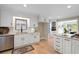 Kitchen with bright white cabinets, modern appliances, and a stylish sink at 316 Anadale Ct, North Charleston, SC 29418