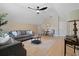 Bright living room featuring a high ceiling, neutral tones, stylish furnishings, and ample natural light at 316 Anadale Ct, North Charleston, SC 29418