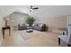 Upstairs living area with hardwood floors, two couches, coffee table, and a ceiling fan at 316 Anadale Ct, North Charleston, SC 29418