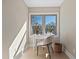 Bright office space featuring a modern desk, chair, and natural light from a large window at 316 Anadale Ct, North Charleston, SC 29418