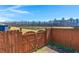 Gated access to a backyard offering pond views and a beautiful tree line, perfect for relaxation and enjoying nature at 316 Knawl Road, Moncks Corner, SC 29461