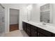 Bathroom featuring double sink vanity and walk in closet access at 316 Knawl Road, Moncks Corner, SC 29461