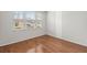 Bedroom with hardwood floors and a large window offering natural light at 316 Knawl Road, Moncks Corner, SC 29461