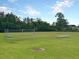 Well-maintained community sports field with a soccer net, bleachers, and a lush green lawn at 316 Knawl Road, Moncks Corner, SC 29461