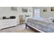 Bedroom featuring a bed with seashell patterned linens and nautical decor on the walls and furniture at 3473 Plow Ground Rd, Johns Island, SC 29455