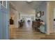 Open entryway boasting beautiful hardwood flooring and a lovely view into the dining room at 3473 Plow Ground Rd, Johns Island, SC 29455